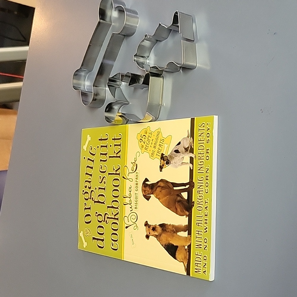 Organic dog biscuit cookbook and cookie cutters.